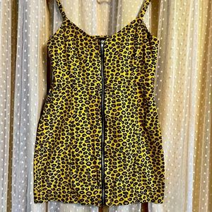 Leopard print denim mini dress. Brand new without tags. By Nasty Gal.